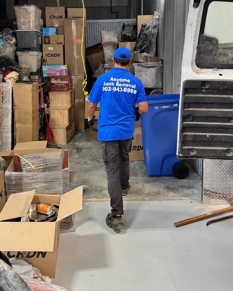Anytime Junk Removal crew loading a truck
